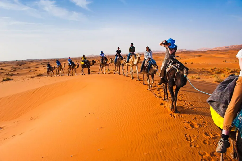 Camel ride at Merzouga Erg Chebbi dunes.